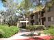 Unit 230, two story building with landscaping at 3031 N Civic Center Plz # 230, Scottsdale, AZ 85251