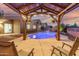 Enjoy evenings relaxing under the pergola by the shimmering pool at 3932 N Silver King Ln, Casa Grande, AZ 85122