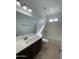 Clean bathroom with vanity, bathtub, and tiled flooring at 12827 S Hermit Rd, Buckeye, AZ 85326