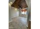 Well-lit bedroom featuring tile floors and a ceiling fan at 12827 S Hermit Rd, Buckeye, AZ 85326