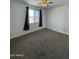 Spacious bedroom featuring carpet flooring and a ceiling fan at 12827 S Hermit Rd, Buckeye, AZ 85326