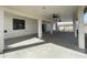 Covered patio with concrete flooring and ceiling fan at 12827 S Hermit Rd, Buckeye, AZ 85326