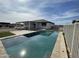 Large rectangular pool with a patio and fence at 12827 S Hermit Rd, Buckeye, AZ 85326