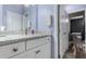 Well-lit bathroom features a granite countertop and white cabinetry at 38334 N 20Th St, Phoenix, AZ 85086