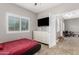 Bedroom featuring storage dresser and view of second seating area at 38334 N 20Th St, Phoenix, AZ 85086