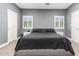 Comfortable main bedroom featuring a ceiling fan and neutral tones at 38334 N 20Th St, Phoenix, AZ 85086