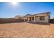 Spacious backyard with a covered patio, offering ample space at 11519 S 50Th Ave, Laveen, AZ 85339