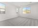 Bright bedroom with grey carpet and mountain views at 11519 S 50Th Ave, Laveen, AZ 85339