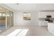 Dining area with tile floors and sliding glass doors to patio at 11519 S 50Th Ave, Laveen, AZ 85339