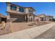 Two-story house with a large garage and a landscaped front yard at 11519 S 50Th Ave, Laveen, AZ 85339