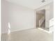 Bright and airy living room with tile floors and view of staircase at 11519 S 50Th Ave, Laveen, AZ 85339