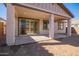 Covered patio with sliding glass doors at 11519 S 50Th Ave, Laveen, AZ 85339