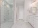 Modern bathroom featuring glass enclosed shower, dual vanity, and sleek design at 19655 E Estrella Rd, Queen Creek, AZ 85142