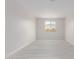 Blank bedroom canvas, light wood look flooring and plenty of natural light at 19655 E Estrella Rd, Queen Creek, AZ 85142