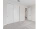 Bedroom featuring a closet with double doors and ensuite bath entry at 19655 E Estrella Rd, Queen Creek, AZ 85142