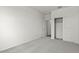 Bedroom featuring carpet floors, base molding, a closet, and neutral walls at 5729 S 243Rd Dr, Buckeye, AZ 85326