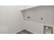 Compact laundry room featuring a shelf, utility hookups, and wood-look floors at 5729 S 243Rd Dr, Buckeye, AZ 85326