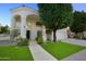 Two-story house with a landscaped front yard at 1521 W Commerce Ave, Gilbert, AZ 85233