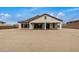 Spacious backyard featuring a covered patio, offering a blank canvas for outdoor living and entertainment at 19679 E Estrella Rd, Queen Creek, AZ 85142