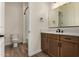 Bathroom featuring modern vanity, ample storage, and separate toilet room at 19679 E Estrella Rd, Queen Creek, AZ 85142