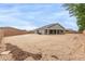 Expansive backyard space with a block fence, awaiting your personal touch and design at 21921 S 197Th St, Queen Creek, AZ 85142