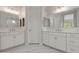 Bathroom featuring double sink vanity, marble countertop, and framed mirrors at 21921 S 197Th St, Queen Creek, AZ 85142