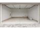 Spacious two-car garage with ample room for storage and parking with water heater at 21921 S 197Th St, Queen Creek, AZ 85142