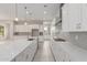 Spacious kitchen featuring an island, modern appliances, and ample counter space for meal preparation at 21921 S 197Th St, Queen Creek, AZ 85142