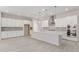Bright and modern kitchen with a large center island, stainless steel appliances, and ample cabinet space at 21921 S 197Th St, Queen Creek, AZ 85142