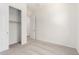 Clean bedroom offers neutral carpet, a closet, and neutral paint throughout at 17225 W Calle Lejos --, Surprise, AZ 85387