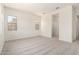 Bedroom featuring bright windows, plush carpeting, and modern fixtures at 17225 W Calle Lejos --, Surprise, AZ 85387