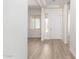 Home foyer featuring a window and a bright white front door at 17225 W Calle Lejos --, Surprise, AZ 85387