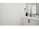 Contemporary bathroom with floating vanity and mirror at 1501 N Miller Rd # 1011, Scottsdale, AZ 85257