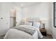 Well-lit bedroom, featuring a cozy bed and closet at 1501 N Miller Rd # 1011, Scottsdale, AZ 85257