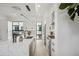 Modern kitchen with white cabinetry and marble countertops at 1501 N Miller Rd # 1011, Scottsdale, AZ 85257