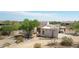 Single-story stucco home with desert landscaping at 19927 W Meadowbrook Ave, Litchfield Park, AZ 85340