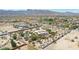 Aerial view showing home, pool, and surrounding desert landscape at 19927 W Meadowbrook Ave, Litchfield Park, AZ 85340