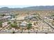 Aerial view of home on a large lot with mountain views and neighborhood context at 19927 W Meadowbrook Ave, Litchfield Park, AZ 85340