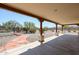 Covered patio with flagstone walkway to the pool and backyard at 19927 W Meadowbrook Ave, Litchfield Park, AZ 85340