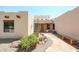 Charming entryway with stone path and desert landscaping at 19927 W Meadowbrook Ave, Litchfield Park, AZ 85340