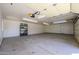 Spacious garage with high ceilings and ample storage at 19927 W Meadowbrook Ave, Litchfield Park, AZ 85340