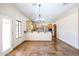 Kitchen with breakfast nook and granite countertops at 19927 W Meadowbrook Ave, Litchfield Park, AZ 85340