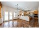 Kitchen with breakfast nook and granite countertops at 19927 W Meadowbrook Ave, Litchfield Park, AZ 85340