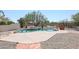 Inviting kidney shaped pool with waterfall feature at 19927 W Meadowbrook Ave, Litchfield Park, AZ 85340