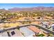 Aerial view of community with mountain backdrop at 12179 E Sereno Rd, Gold Canyon, AZ 85118