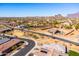 Aerial view of a new Arizona community with mountain views and desert landscaping at 12179 E Sereno Rd, Gold Canyon, AZ 85118