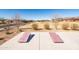 Two cornhole boards in a community space at 12179 E Sereno Rd, Gold Canyon, AZ 85118