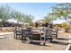 Relaxing firepit area with seating for community gatherings at 12179 E Sereno Rd, Gold Canyon, AZ 85118