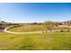 Community greenbelt with walking path at 12179 E Sereno Rd, Gold Canyon, AZ 85118