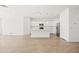 Bright white kitchen featuring island and stainless steel appliances at 12179 E Sereno Rd, Gold Canyon, AZ 85118